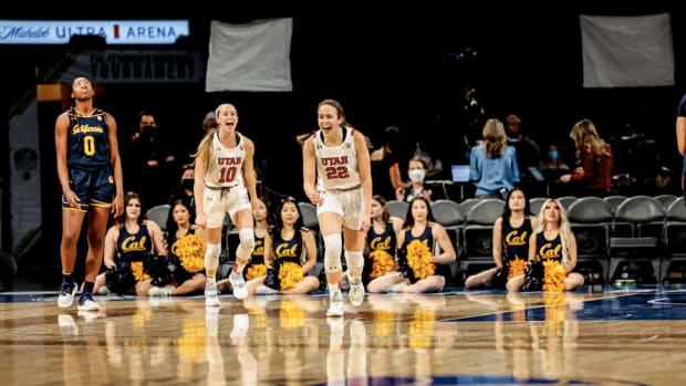 Utah women's basketball players No. 22 Jenna Johnson and No. 10 Dru Gylten.